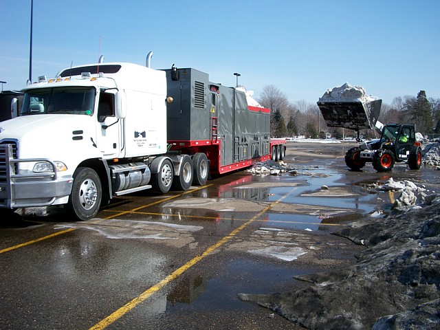 Clearing Snow in a Parking Lot - SND1800